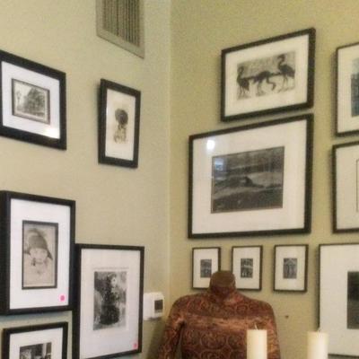 Black and white framed art and photos
