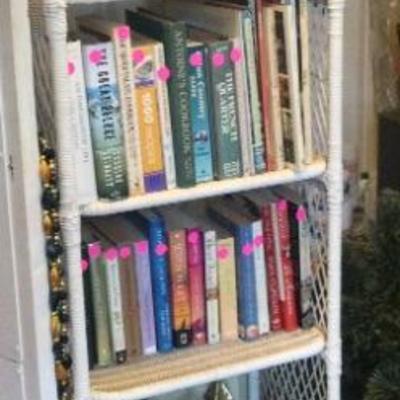 Wicker shelf of books