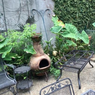 Terracotta fireplace, patio furniture