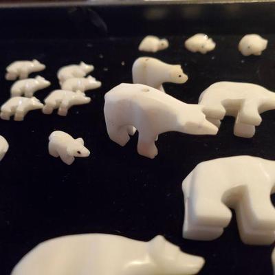 native american carved white bears 