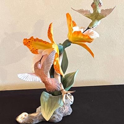 Boehm Rufous Hummingbird with Orchid 40440

Limited edition; number 322/750. Measures 9