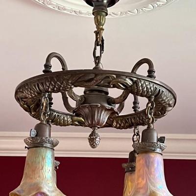 Antique Ceiling Chandelier with Durand Glass Shades. A gorgeous chandelier with pineapple details accented with stunning glass shades. 