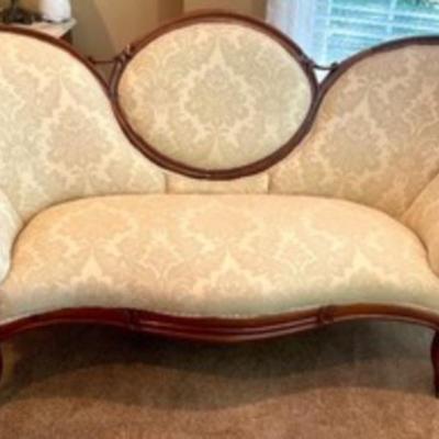 So distinctive! This Antique Medallion Walnut Settee / Sofa / Couch measures 63 x 29 x 37 inches. There is very light wear. 