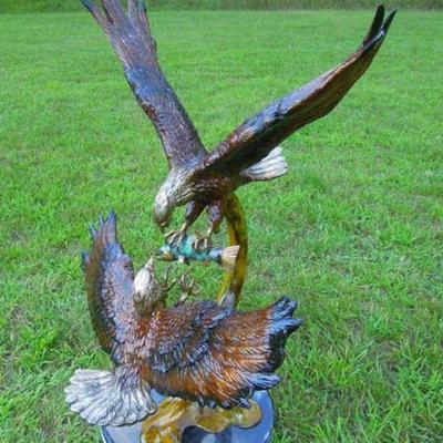 Bronze sculpture of dueling eagles