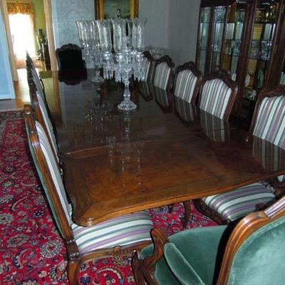 Bau dining room table with 14 chairs.  Table 8' extends to 12'