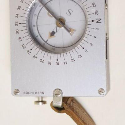 1172	SWISS POCKET COMPASS BUCHY HAAG-STREIT, APPROXIMATELY 2 IN X 2 1/2 IN X 1 IN
