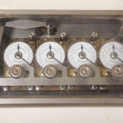 1189	TIME CLOCK FOR BANK VAULT W/KEY, APPROXIMATELY 8 IN X 5 IN X  IN
