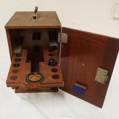 1158	ANTIQUE MAHOGANY MICROSCOPE CASE W/SOME LENSES, LOSS TO LEFT FRONT EDGE OF CASE, APPROXIMATELY 10 IN X 12 IN X 15 IN
