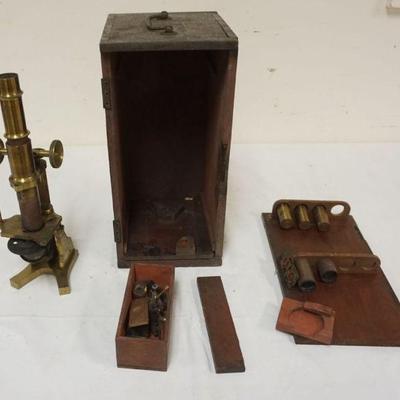 1212	ANTIQUE BRASS MICROSCOPE IN FITTED BOX, VERNEER ADJUSTMENT TO RAISE & LOWER STRIPPED, APPROXIMATELY 7 IN X 7 IN X 14 IN
