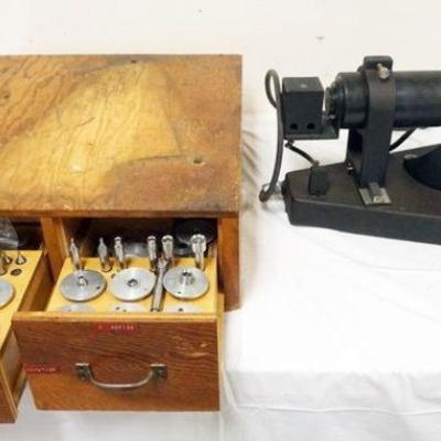 1152	X-Y MEASURING MICROSCOPE WITH SPECIMAN HOLDERS, BOX MEASURES APPROXIMATELY 20 IN X 22 IN X 7 IN H
