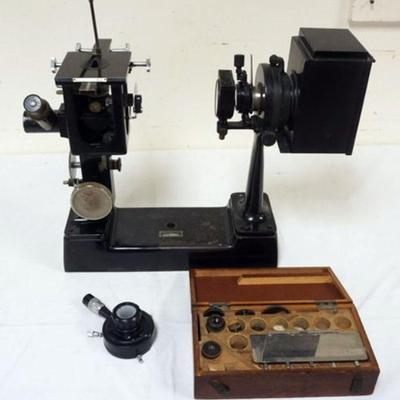 1131	METALOGRAPHIC MICROSCOPE BY BAUSCH-LOMB, APPROXIMATELY 21 IN X 8 IN X 18 IN
