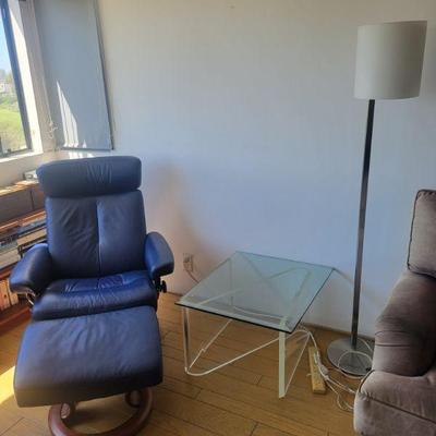 Mid century modern leather chair with wood base and ottoman