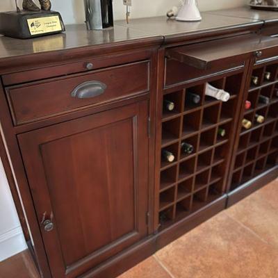 Pottery Barn Modular Wine Bar- It is 4 separate pieces.  Each has a drawer and pull out tray.  Execellent condition.  