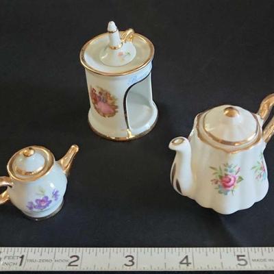PCT141 - Miniature Tea Pots And Candle Light