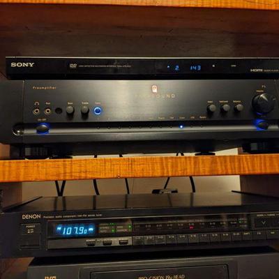 Sony Dvd player on top of Parasound Preamplifier. Next Denon Precision audio component AM/FM stereo tuner. Bottom-JVC Pro-cision  VHS 4...