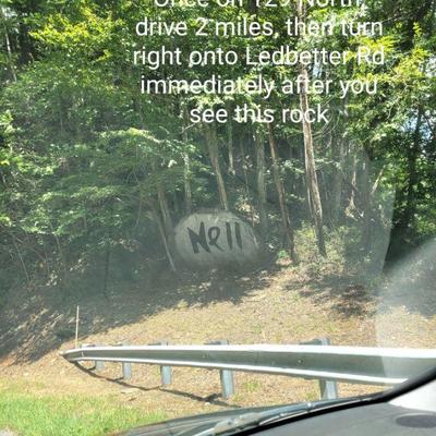 Turn just before the rock if driving from Robbinsville. Turn just past this rock if coming from the opposite direction. It's in  a...