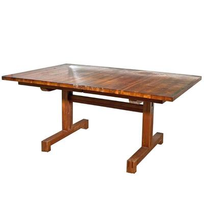 EXTENDED LEAF DINING TABLE | Extending leaf dining table made from cut and stacked wood atop H-stretcher. Includes two leaves each with a...