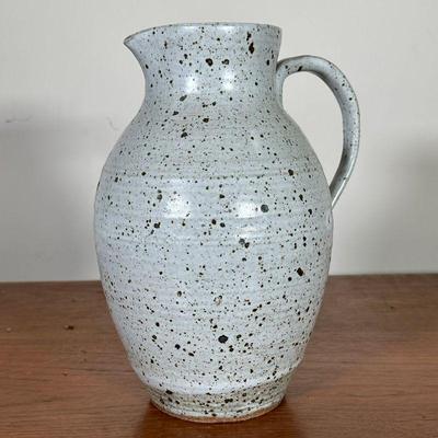 TALL GLAZED PITCHER | Speckled white-and-brown glazed stoneware ceramic pitcher. - h. 11 x dia. 7.5 in 