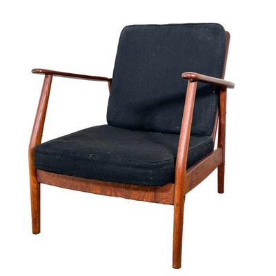 STYLE OF AAGE PEDERSEN ARMCHAIR | Deep reclined wooden armchair with black cushions, solid wood with strapwork supports. - l. 27 x w. 24...