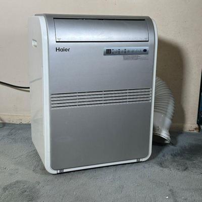 HAIER STANDING AC UNIT | Haier standing AC unit with extendable tube to reach the window. - l. 18 x w. 13 x h. 23.5 in 