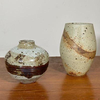 (2PC) RICK CROWN SMALL VASES | Two decorative glazed ceramic vases, with elegant brown stripe pattern, by Rick Crown. - h. 6.5 x dia. 4.5...