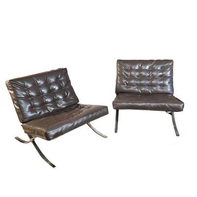 (2PC) PAIR BARCELONA STYLE CHAIRS | In the style of Ludwig Mies Van Der Rohe for Knoll. Chrome with faux leather, vinyl straps and...