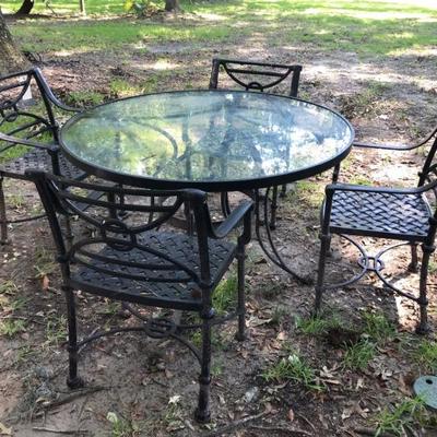 caste iron table and set of 4 chairs $495
table 48