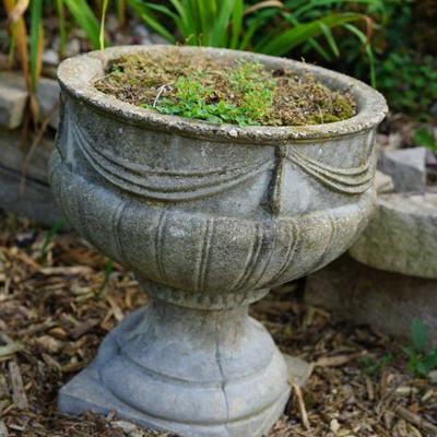 There are a pair of these garden urns