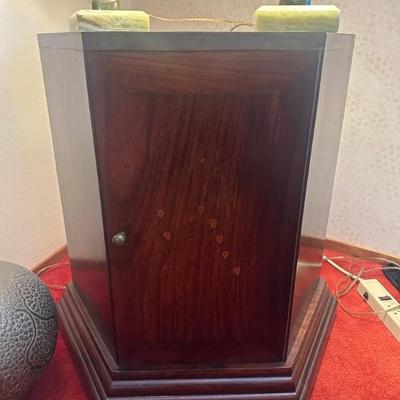 Rosewood cabinet with brass top