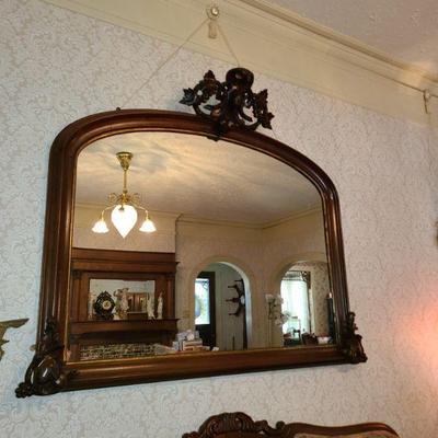 Large mirror with orante carvings and details