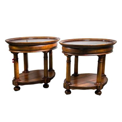 (2PC) PAIR OVAL WOOD SIDE TABLE | Oval side tables with mahogany top, spindle legs and lower shelf with orb feet. - l. 30 x w. 23 x h....
