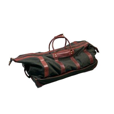 LARGE ORVIS SUITCASE | Large leather and green canvas suitcase with wheels and 2 large pockets. - l. 52 x w. 15.5 x h. 17 in 