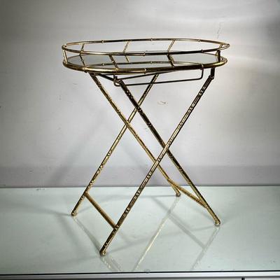 MIRROR TOP SIDE TABLE | Gold-painted mirror top side table with bamboo-style folding metal legs. - l. 24 x w. 16.5 x h. 27 in 