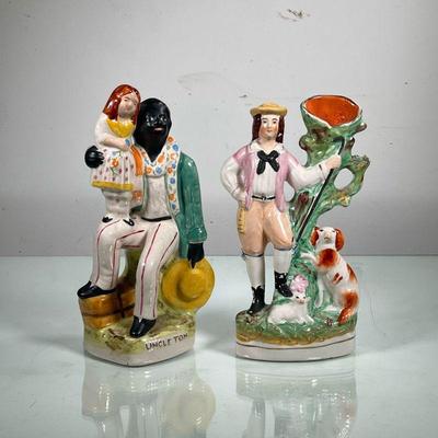(2PC) PAIR STAFFORDSHIRE PAINTED FIGURINES | Includes shepherd with dog and lamb, and Uncle Tom. - l. 4 x w. 4 x h. 10 in 
