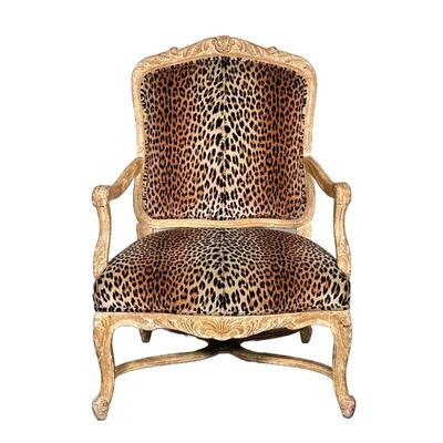 CHEETAH PRINT ARMCHAIR | Large wide armchair with cheetah-print cushion and composite frame. - l. 30 x w. 25 x h. 42.5 in 