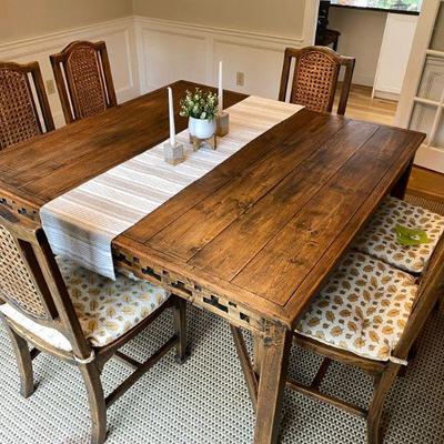 Reclaimed Teak wood dinning table is 5' square with 8 chairs