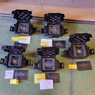 #6022 â€¢ (5) Invicta Hard Cases & Informational Pamphlets
