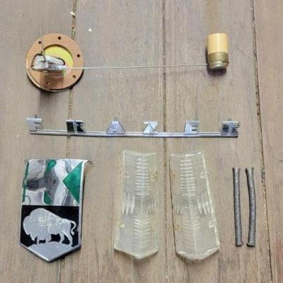 #7612 â€¢ Kaiser Frazer Emblems & Fuel Tank Sending Unit
