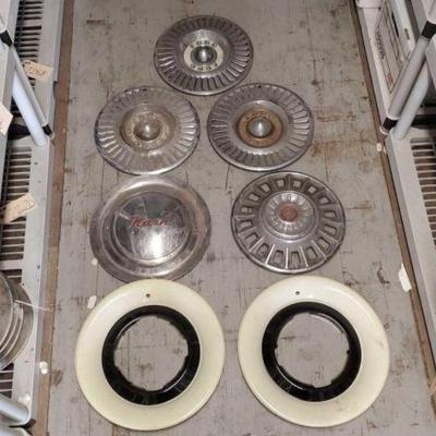 #7282 â€¢ (7) Hubcaps
