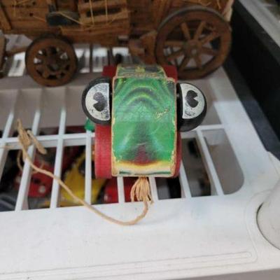 #655 â€¢ Wooden covered wagon and jolly jumper
