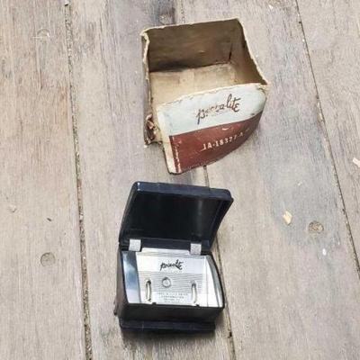 #7570 â€¢ Pres-A-Lite Cigratte Lighter / Dispenser
