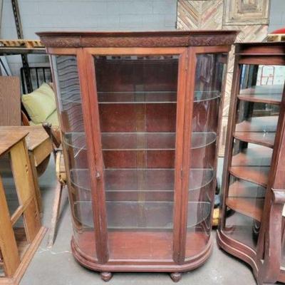 #526 â€¢ Curved Glass Cabinet
