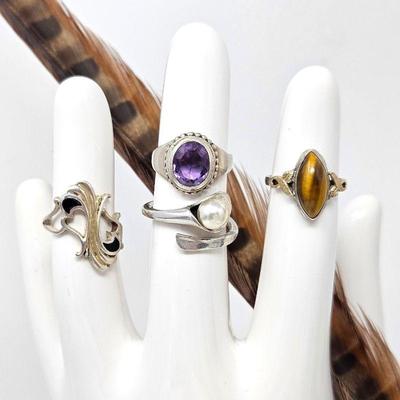 Set of Four Sterling Silver Women's Rings Sizes 6 - 6.5. Amethyst, Tiger Quartz, Onyx, and Pearl Rings (tw 14.5g)