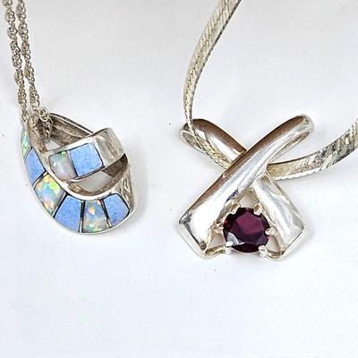 Set of Two Sterling Pendants on Sterling Necklaces - One with a Garnet, the Other with Fire Opals