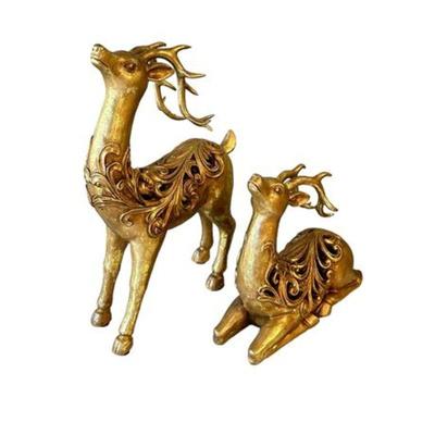 Lot 156  
Set of Two Gold Toned Ornate Metal Christmas Reindeer Figurines
