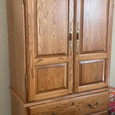 Beautiful armoire with locked case 