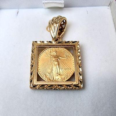 Lot 66 - $5 Gold American Eagle Coin Set in 14K Yellow Gold Pendant