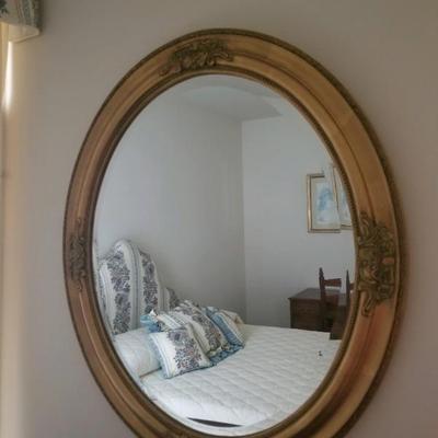 Vintage oval framed mirror