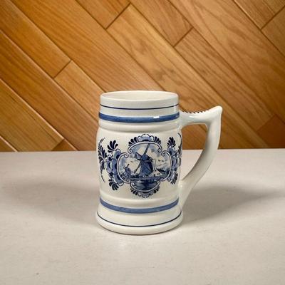 HAND PAINTED MUG | Hand-painted mug depicting scenes of Dutch windmills in the countryside. - l. 5 x w. 3 x h. 5.5 in 