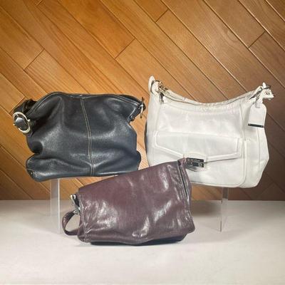 (3PC) SET OF LEATHER HANDBAGS | Three leather handbags, one white Cole Haan, One brown, flat DKNY, and one Black Liz Claiborne handbag. -...